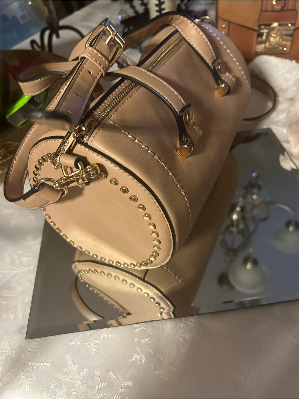 Womens Beige Barrel Crossbody Bag with Gold Stud Accents